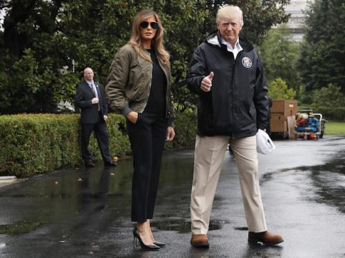 President Donald Trump, accompanied by first lady Melania Trump, gives a thumbs-up as they walk to Marine One on the South Lawn of the White House in Washington, Tuesday, Aug. 29, 2017, for a short trip to Andrews Air Force Base, Md., then onto Texas to survey the response to Hurricane Harvey. The hurricane is the first major disaster of Trump's presidency. (AP Photo/Jacquelyn Martin)